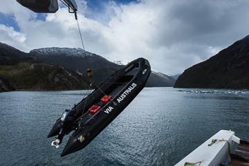 Zodiac being lowered off the MV Australis, Tierra del Fuego, Chile